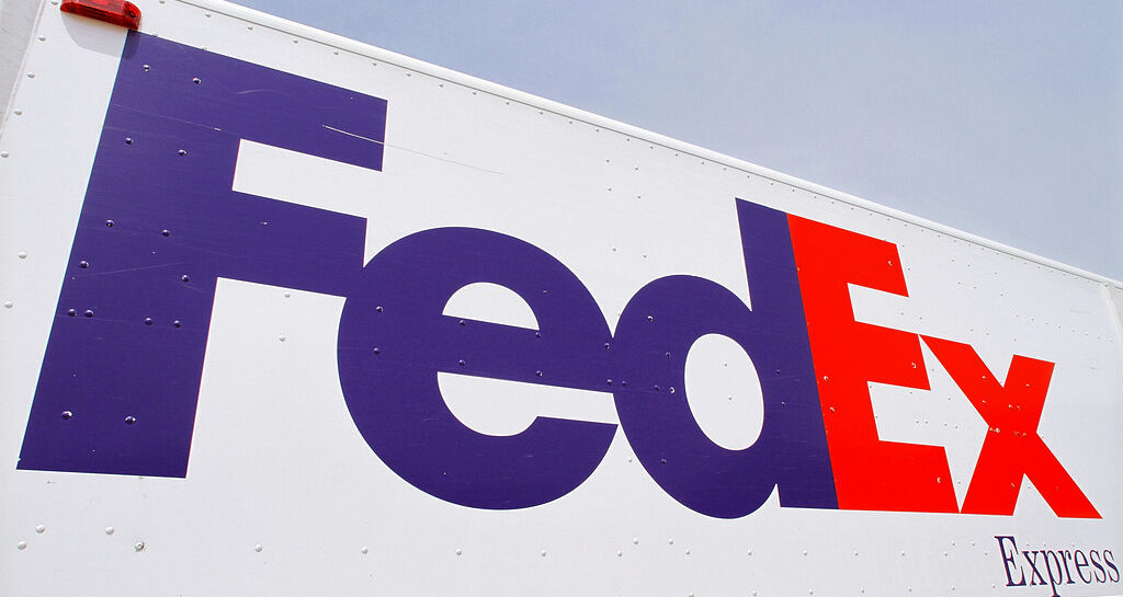 FedEx to close stores, put off hiring as demand slumps